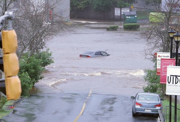 Canada Hit by Dual Weather Crisis: Heat Dome Brings Extreme Heat While Flooding Worsens in Central Regions